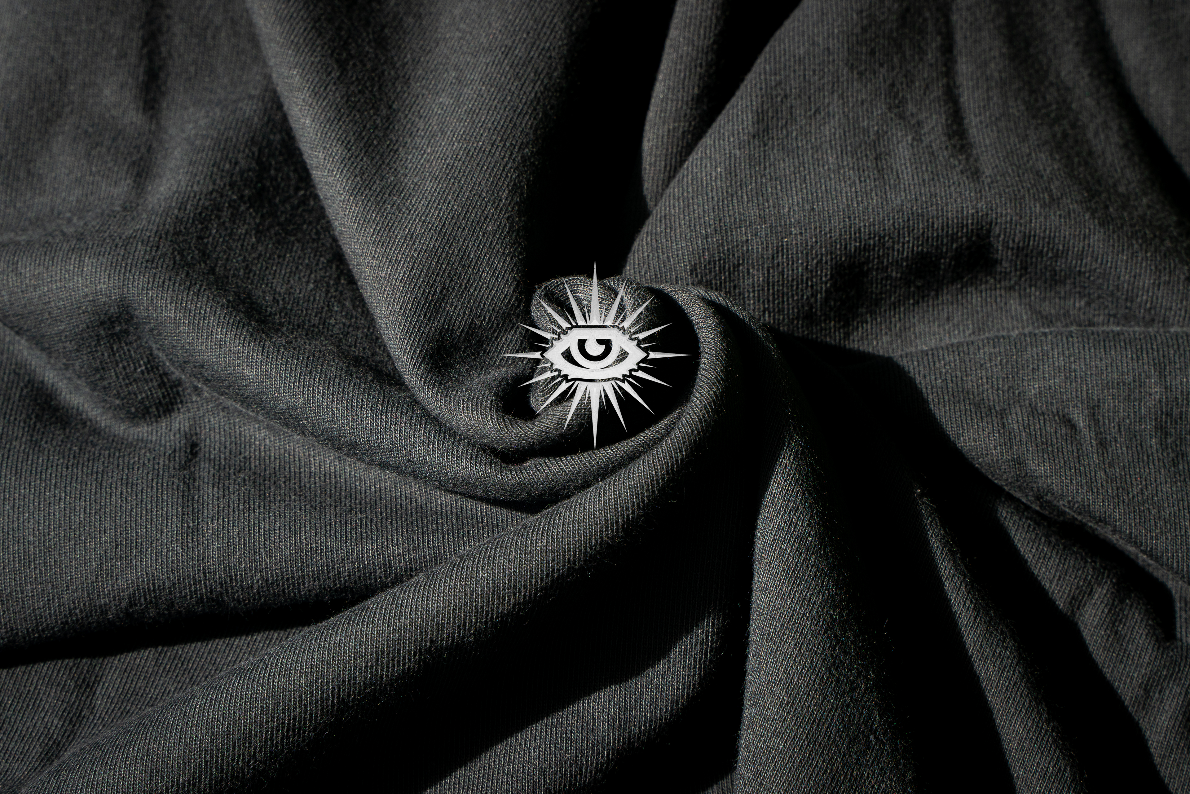 Close-up of premium fabric used by Suppressed, showcasing attention to quality and sustainability.